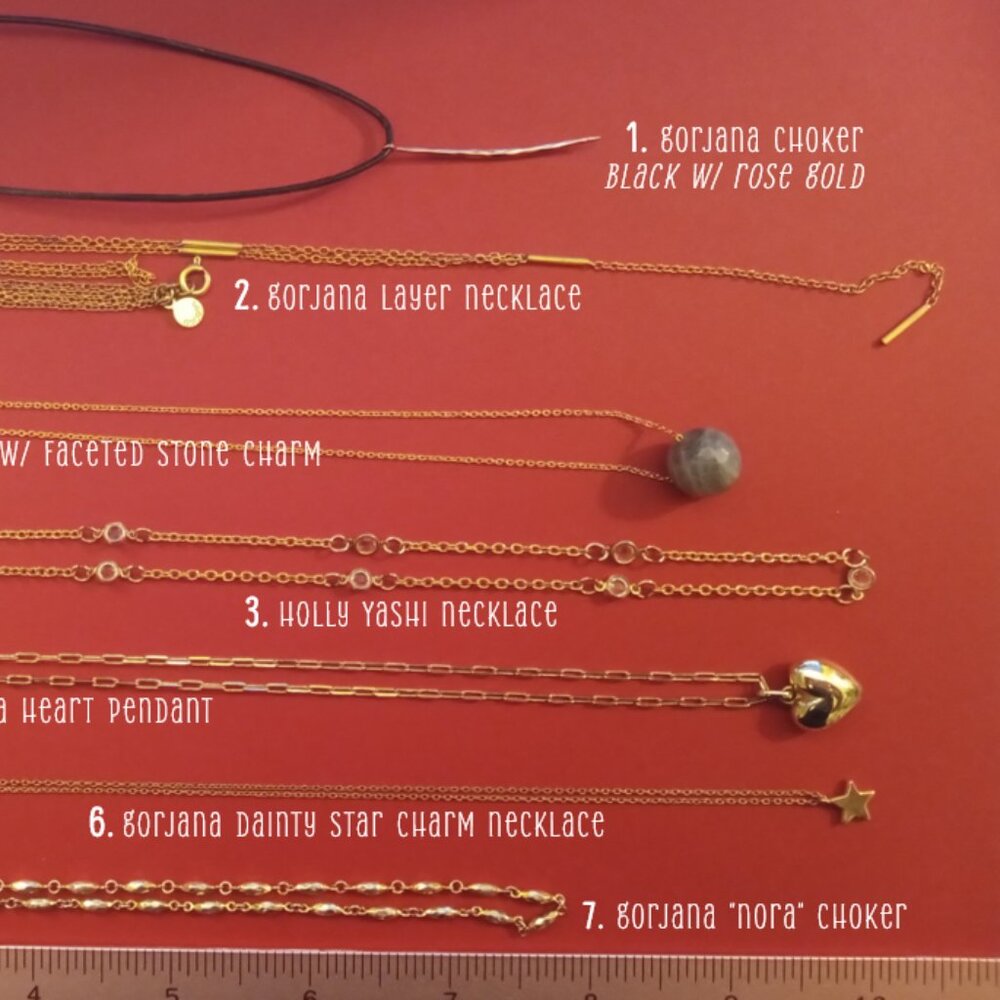 Black choker w/ rose gold hammered-saber charm, lobster clasp